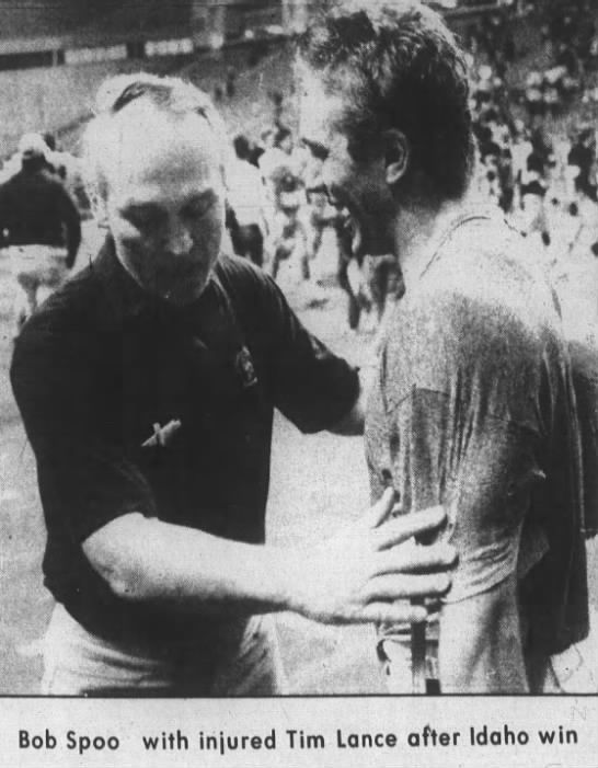 Bob Spoo with injured Tim Lance